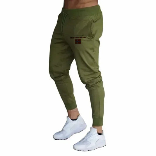 Men's athletic track pants, ideal for jogging and running. Comfortable and casual. Spring/Autumn 2026 collection. Slim fit.